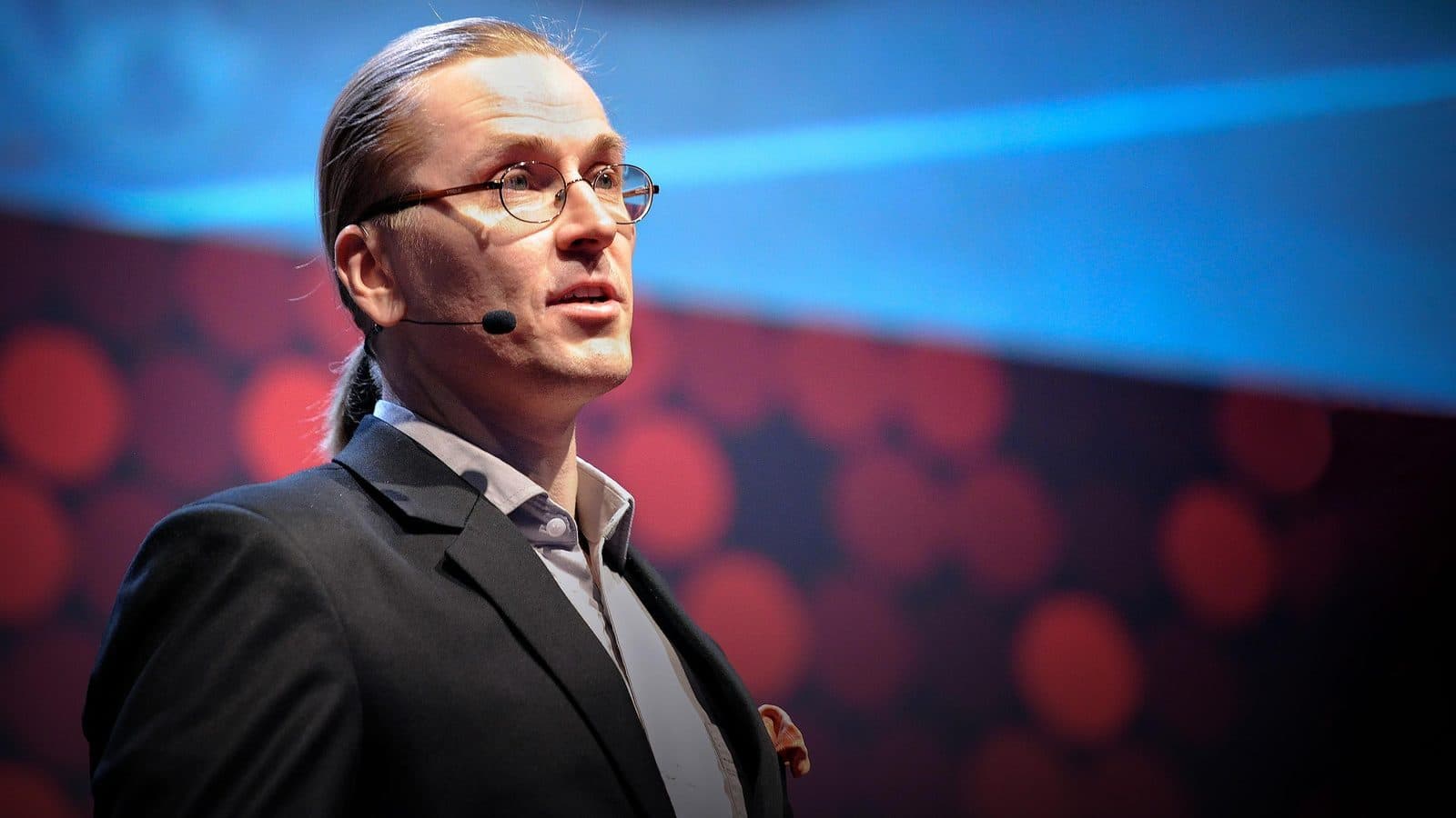 Mikko Hyppönen speaking on stage at a cybersecurity conference