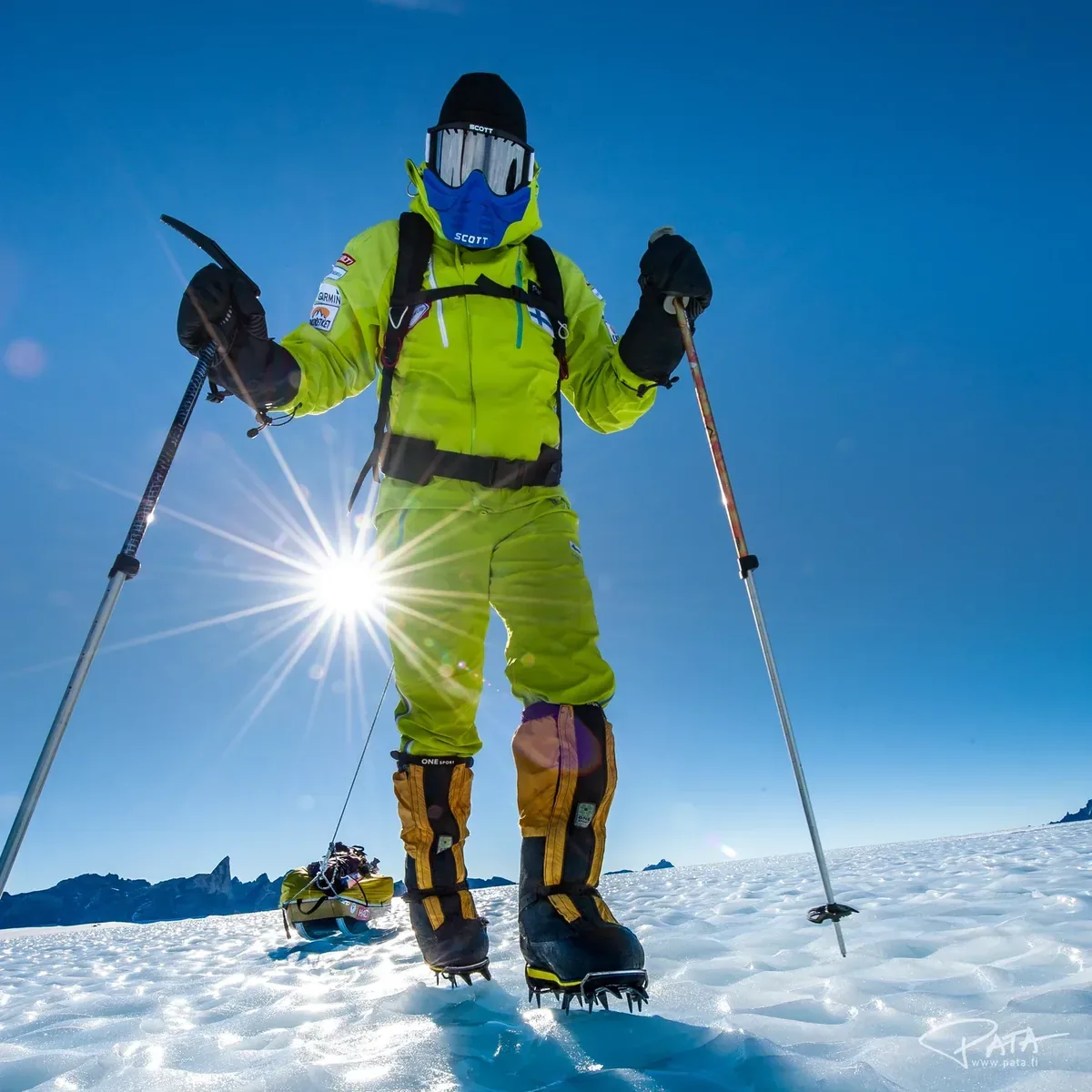 Pata Degerman on a polar expedition, pulling a supply sled across ice